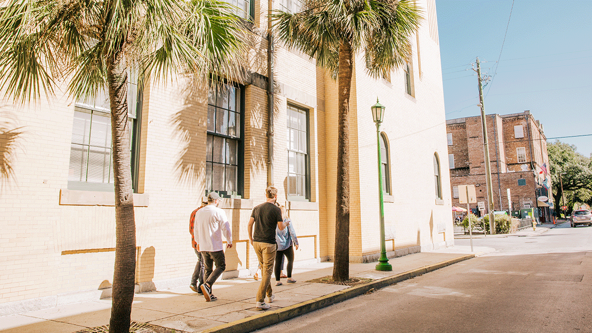 Photo of Focus Lab team members walking on a sidewalk in Savannah, GA.